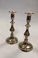Antique Pair of Candlesticks in BrassMeasures 21,8cm / 8.58 inchOne stick is a bit loose