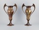 Auguste Delaherche (1857-1940), a pair of large art nouveau bronze vases 
decorated with pine cones. Baluster-shaped.