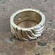 Wide sculptural 
ring of 
sterling 
silver. Ø 22 
mm. internal 
dimensions 16 
mm. Stamped 
925s. ...