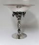 Georg Jensen. 
Sterling (925). 
Grape bowl. 
Model 263. 
Height 19 cm. 
Diameter 18,1 
cm. Produced 
...