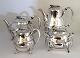 Evald Nielsen. 
Silver 
coffee-tea 
service (830) 
with grapes. 
Consisting of 
coffee pot, 
teapot, ...
