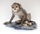 Dahl Jensen. 
Porcelain 
figure. Monkey 
on plinth. 
Model 1086. 
Length 21 cm. 
Height 15 cm. 
(1 quality)