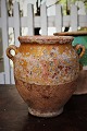 Decorative 19th century clay jug with handle from the South of France with remnants of yellow ...