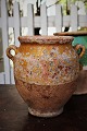 Decorative 19th 
century clay 
jug with handle 
from the South 
of France with 
remnants of 
yellow ...