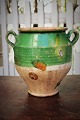 Decorative 
1800s clay jug 
with handle 
from the South 
of France with 
partial green 
glaze and with 
...