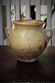 Decorative 1800s clay jug with handle from the South of France with cream-colored glaze and with ...