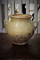 Decorative 
1800s clay jug 
with handle 
from the South 
of France with 
cream-colored 
glaze and with 
...