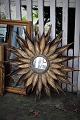 Large decorative sun mirror from the 70s in gilded metal with a fine patina. Dia:86cm. Mirror ...