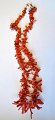 Coral chain, 
20th century. 
Bright red 
corals. L.: 50 
cm. With silver 
clasp.