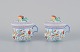 Herend, Hungary, two porcelain bouillon cups, hand-painted with flowers and 
birds.