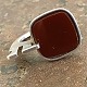 Sculptural ring 
of sterling 
silver with red 
stone. Internal 
dimensions 17 
mm. Stamped 
925s. ...