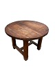 Round dining table in patinated oak, originally from Denmark around the 1940s. In beautiful ...