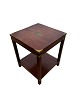 Antique 
mahogany side 
table with 
brass on the 
corners.
Dimensions in 
cm: H:84 W:44 
D:44
