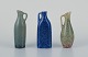 Carl Harry 
Stålhane for 
Rörstrand, 
three miniature 
vases/pitchers.
Glaze in 
blue-green ...