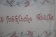 An old table cloth with embroidery, handmade130cm x 30cmText: "Im Hause das Beste sind ...