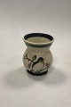 Royal 
Copenhagen Vase 
in Matt Iron 
Glaze with Bird 
No 10 / 33
Measures 
12,5cm / 4.92 
inch