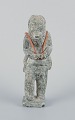 Greenlandica, an older hunter with a seal on his back, sculpture in soapstone.Mid-20th ...