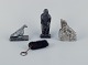 Greenlandica, 
three pieces of 
soapstone and a 
black pouch 
with a keyring. 
Features a 
ptarmigan, ...