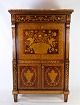 French 
secretary in 
mahogany with 
many intarsia 
and drawers 
with matching 
marble top from 
around ...