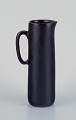 Carl Harry Stålhane for Rörstrand, ceramic jug with glaze in dark brown shades.