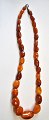 Danish amber 
chain, polished 
pieces, 19./20. 
cth. 32 pieces. 
L.: 48 cm.
Great 
condition!