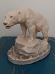 Painted ceramic 
figure of a 
polar bear 
Designed by 
Lauritz Jensen 
in 1904. Has 
two small chips 
...