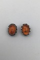 Georg Jensen 
Sterling Silver 
Ear Clips 
Annual Earclips 
2001 Amber 
Measures 1.7 cm 
x 1.2 cm (0.66 
...