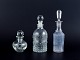Danish 
glassworks, 
three 
oil/vinegar 
jugs in 
different 
designs. Clear 
glass.
1930/40s.
In ...