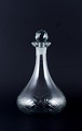 Danish 
glasswork, wine 
decanter in 
clear glass. 
Ball-shaped 
faceted 
stopper.
From the ...