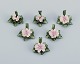 Capodimonte, 
Italy, a set of 
six porcelain 
table card 
holders shaped 
like water 
lilies. ...