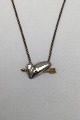 Georg Jensen 
Sterling 
Silver/Gold 
Pendant 2003 
Isabell 
Kristensen 
Mesures Pendant 
3 cm x 1.6 cm 
...