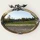 Older large oval faceted mirror in silver-plated metal frame, nicely patinated. Approx. ...