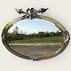 Older large 
oval faceted 
mirror in 
silver-plated 
metal frame, 
nicely 
patinated. 
Approx. ...