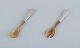 Georg Jensen, 
Viking, a salad 
set in 830 
silver and 
horn.
Stamped with 
the mark used 
between ...