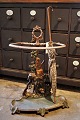 Old 19th 
century 
umbrella stand 
in cast iron 
with hunting 
motif 
(Dog and gun) 
with old ...