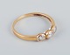 9 karat Chanti gold ring adorned with three semi-precious stones. Modernist 
design.