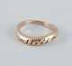 8 karat gold ring in a modernist design.