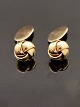 14 carat gold 
knot cufflinks 
D. 1.2 cm. from 
goldsmith Hans 
Jensen 
Copenhagen item 
no. 539369