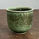 Small Saxbo 
vase with green 
and charcoal 
gray glaze. 
Stamped SAXBO 
DENMARK 5 and 
monogram. H. 
...