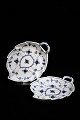 Royal 
Copenhagen Blue 
Fluted Plain 
leaf shaped 
small dish with 
handle. 
Decoration 
number: 1/143. 
...