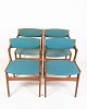 Set of four 
dining chairs 
in teak and 
light blue 
fabric of 
Danish design 
and 
manufactured by 
...