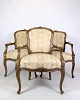 Rococo 
armchairs with 
decorated 
fabric in dark 
wood from 
around the 
1930s. Is in 
very good ...