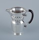 Georg Jensen, 
large Art 
Nouveau pitcher 
in sterling ...