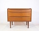 Dressing table 
veneered with 
teak wood, 
front with 
fold-up mirror 
panel, 
including two 
drawers. ...