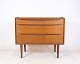 This dressing 
table, veneered 
with teak wood 
and 
manufactured by 
Ølholm 
Møbelfabrik in 
the ...