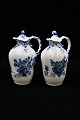 Royal 
Copenhagen Blue 
Flower Curved 
oil / vinegar 
bottles.
H:14cm. 
Decoration 
number: 
10/1540. ...