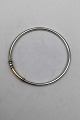 Georg Jensen / 
Hans Hansen 
Sterling Silver 
/ Gold Bangle 
Measures Diam 
6.5 cm (2.55 
inch) Weight 
...