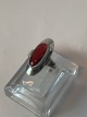 Silver ladies' 
ring with red 
stone
stamped 925S
Size 54
Nice and well 
maintained 
condition