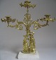 English 
candelabra in 
gilded bronze, 
19th century. 
With two 
figures under a 
tree. Stamped: 
...