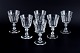 Val St. Lambert, Belgium, a set of six "Lalaing" red wine glasses in clear 
faceted cut crystal glass.